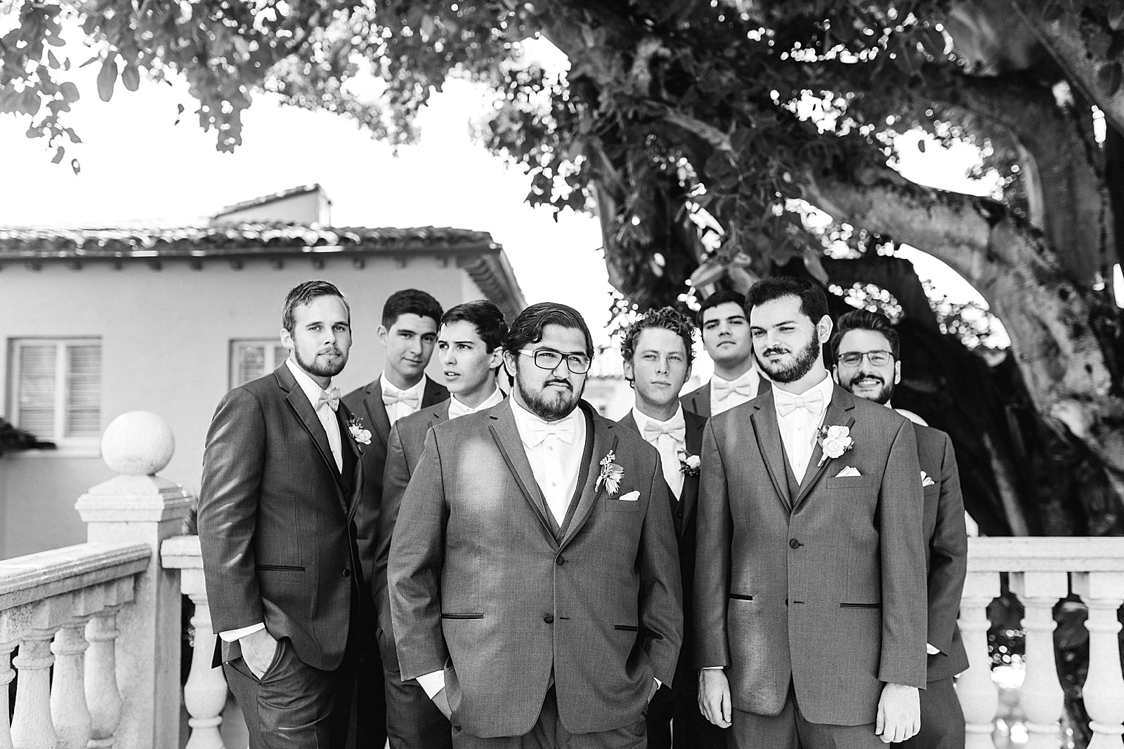 Black and White groomsmen portrait at Boca Raton wedding planned by Poppy + Lynn