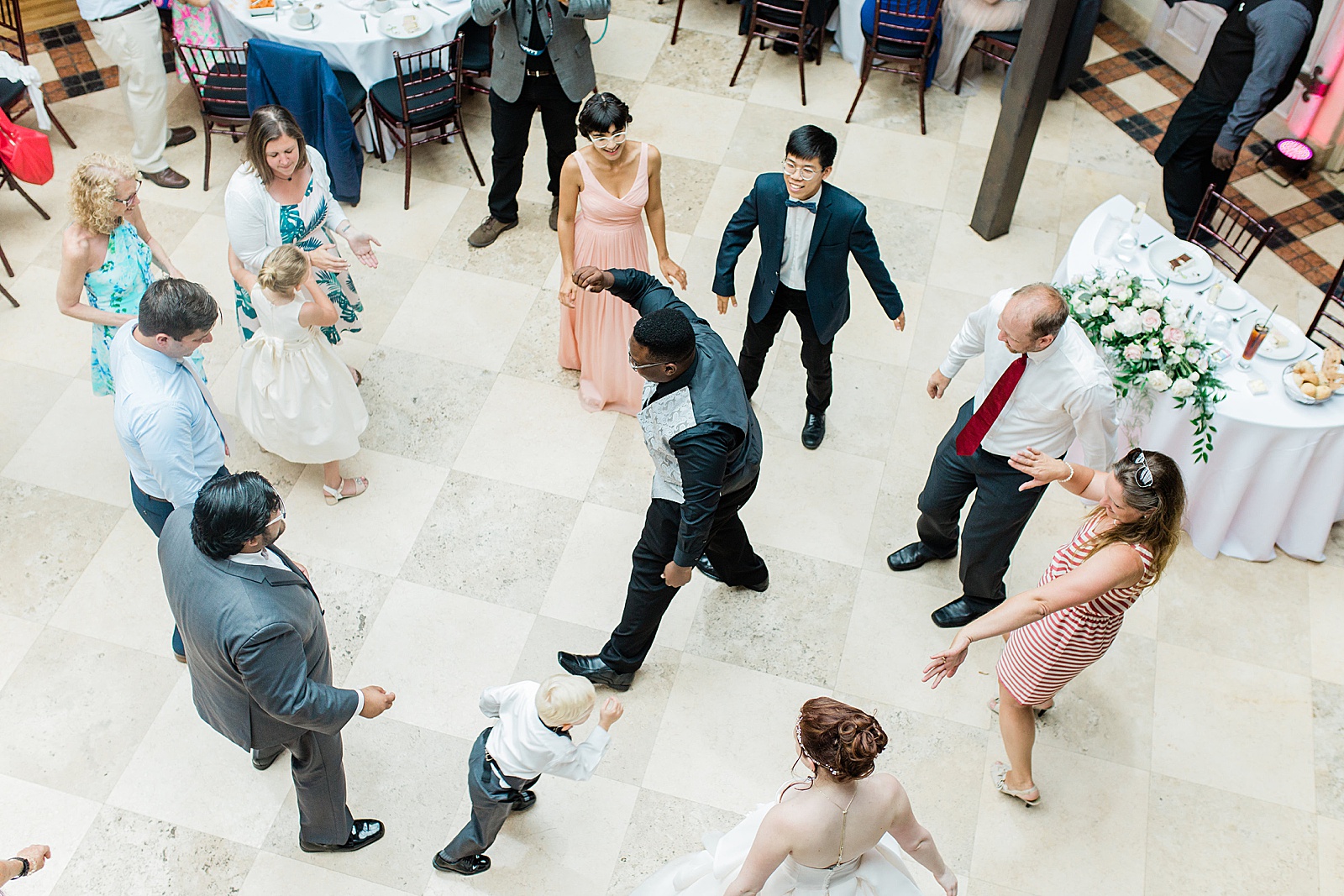 Guests Dancing at Reception at The Addison designed by NYC Wedding Planner, Poppy + Lynn