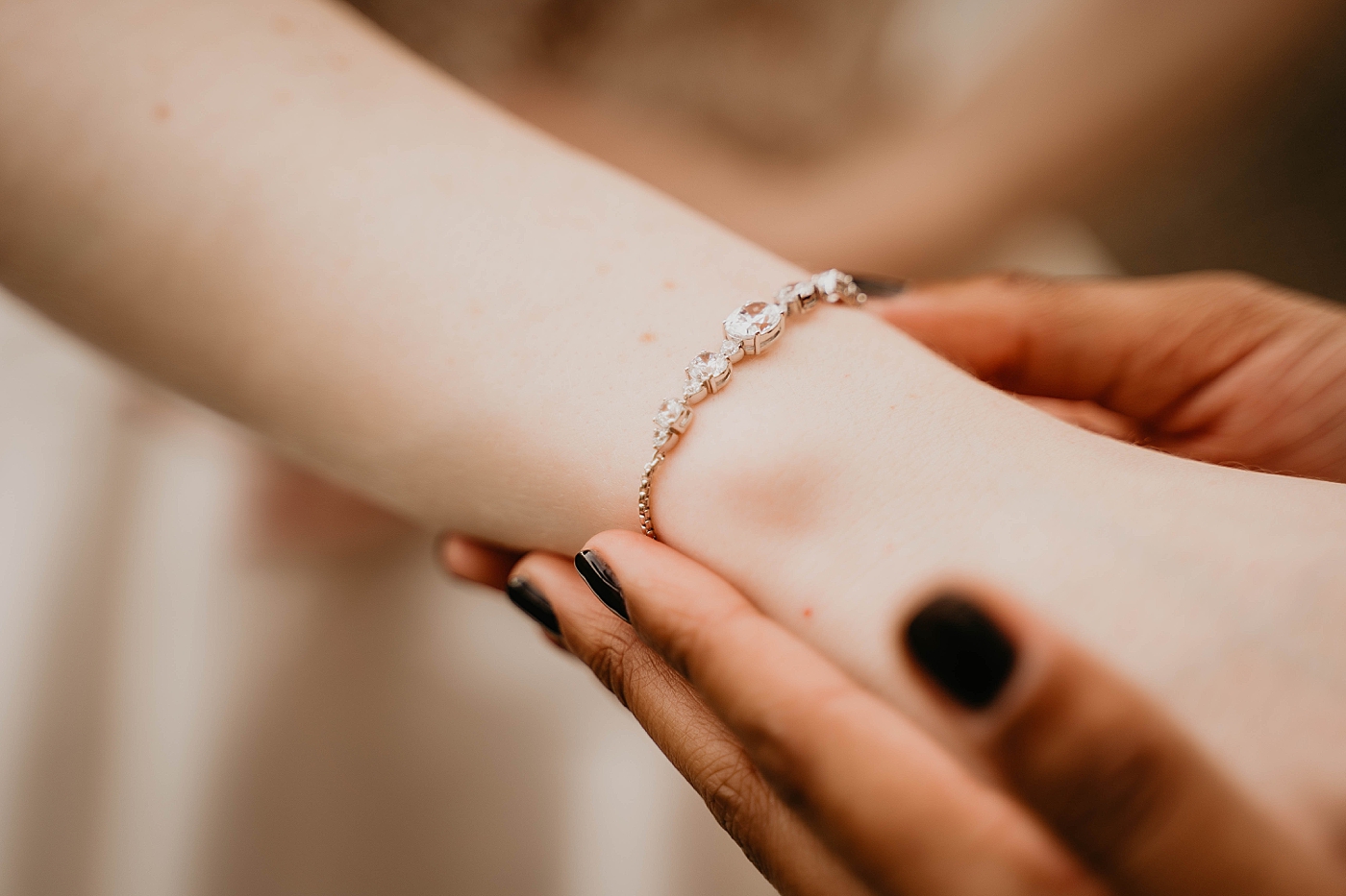 Closeup shot of Bride's jewelry diamond bracelet Romantic Winter Wedding captured NYC Wedding Planner Poppy and Lynn