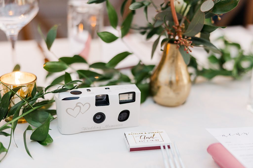 Detail shot of matchbox and disposable camera for Reception 
