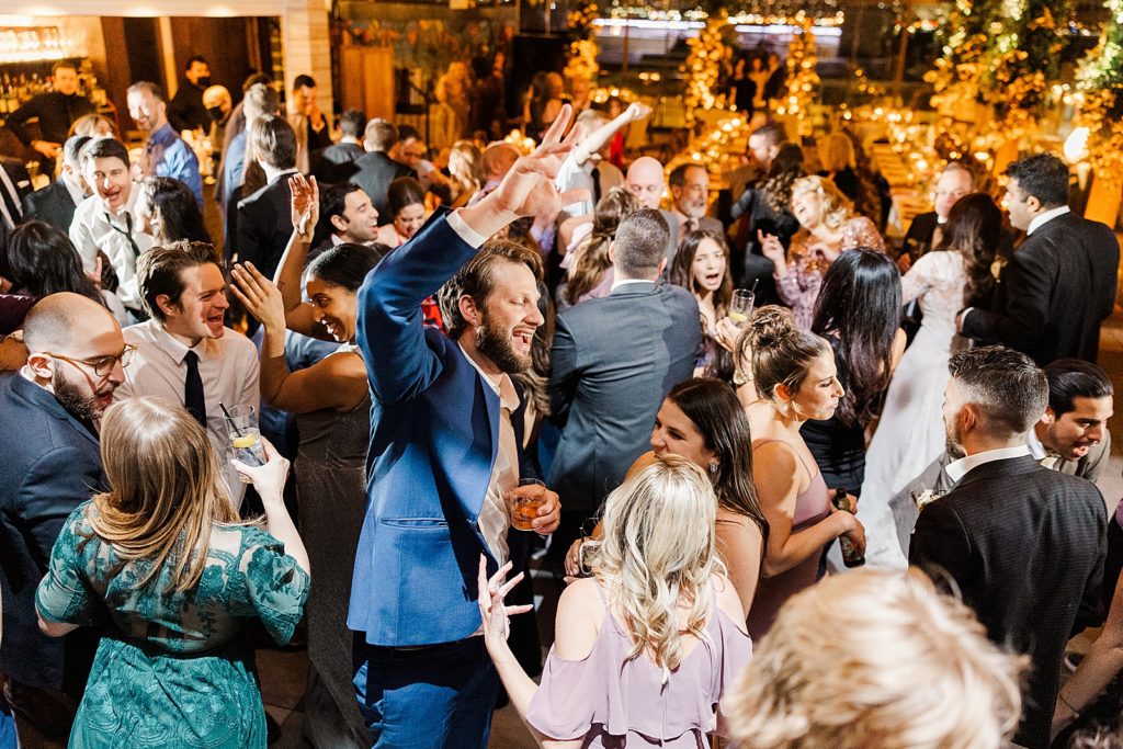 Overhead shot of wedding guests dancing at Reception