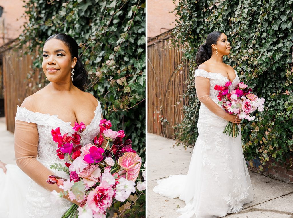 Portrait of Bride holding pink bouquet by green leaf wall