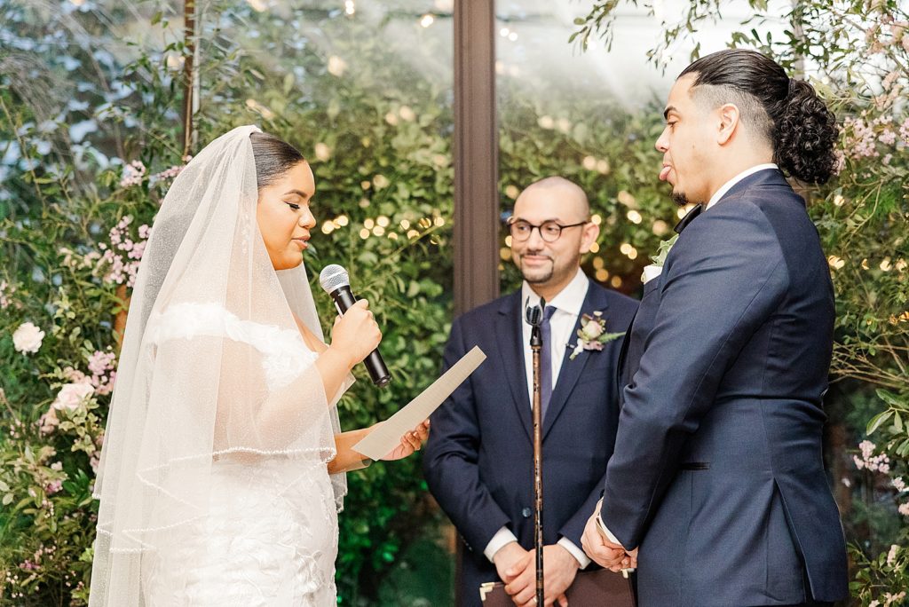 Bride giving vows during Ceremony to Groom