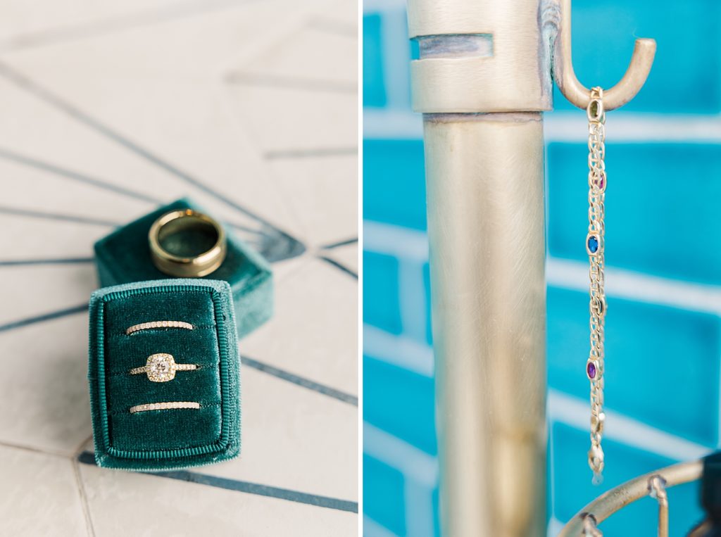 detail shot of engagement ring and wedding bands on Emerald box with necklace hanging