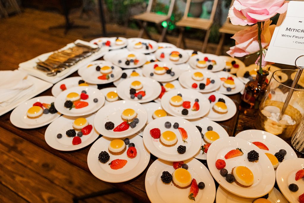 Detail shot of artsy dessert tart and fruit plates for Reception