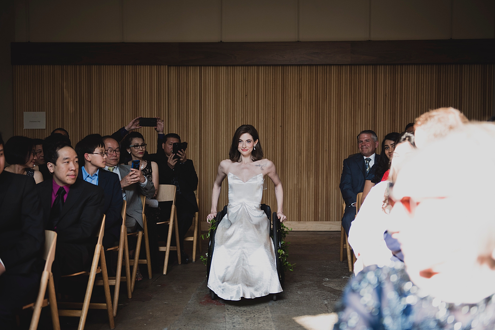 Shot of the bride making her way down the aisle. 