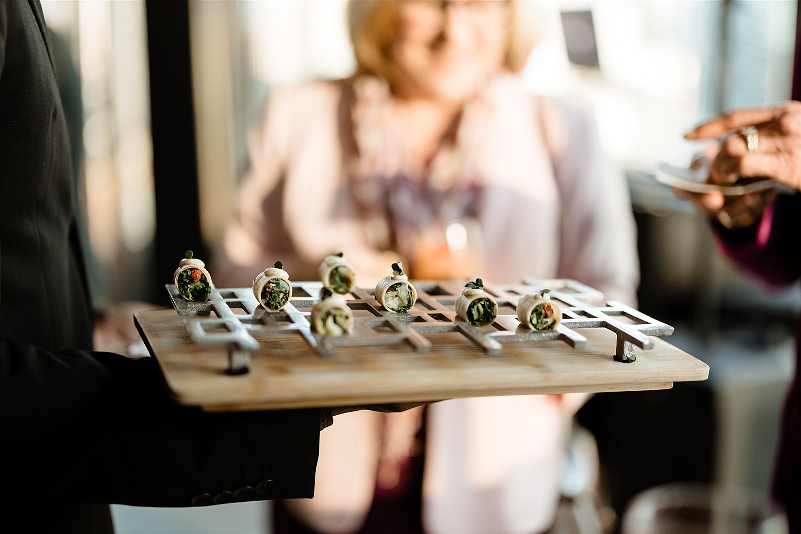 Shot of hors d'oeuvres being served on a tray. 